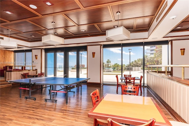 rec room with french doors, coffered ceiling, and hardwood / wood-style flooring