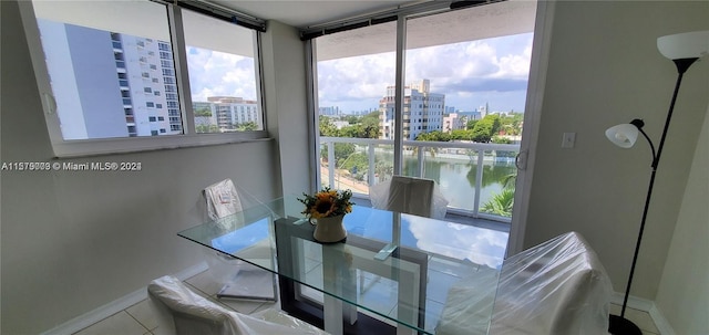 dining space featuring tile floors