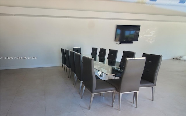 dining area with tile floors