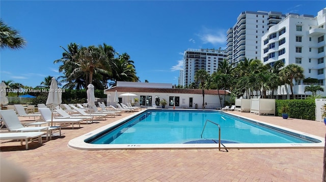 view of swimming pool with a patio area