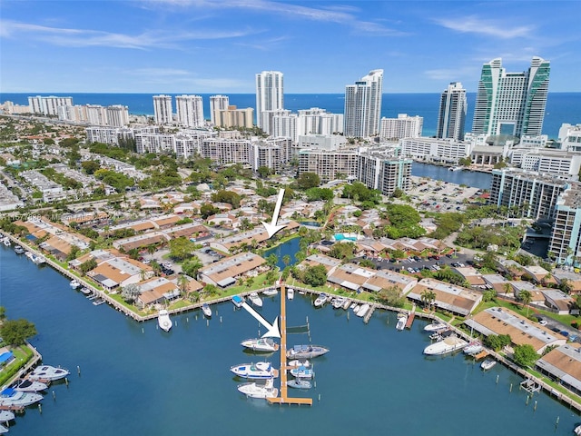 birds eye view of property featuring a water view