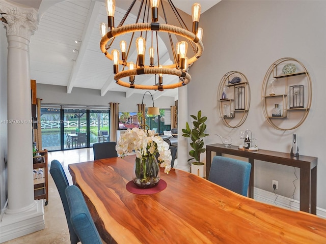 tiled dining area with an inviting chandelier, ornate columns, and vaulted ceiling with beams