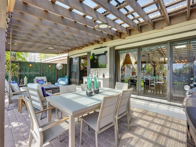 view of terrace with a pergola