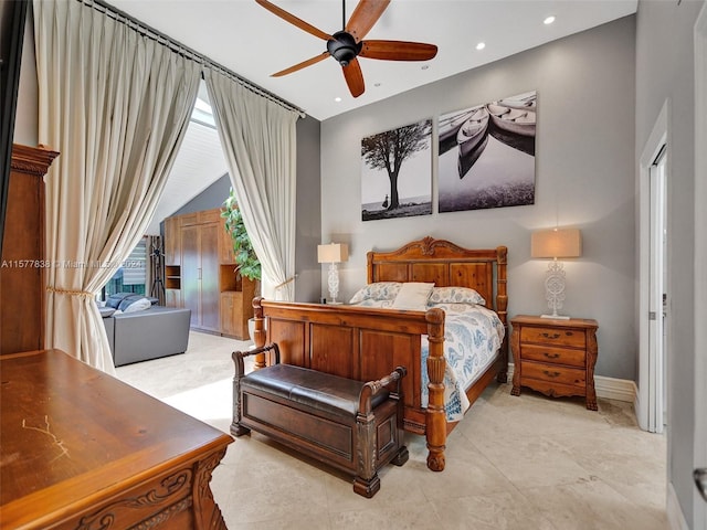 tiled bedroom featuring ceiling fan