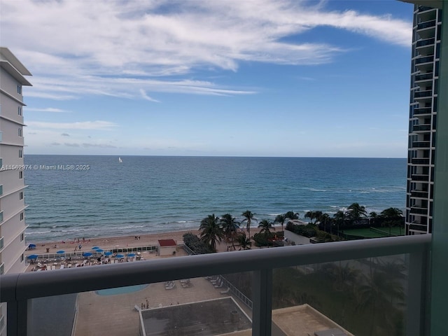 view of water feature with a beach view