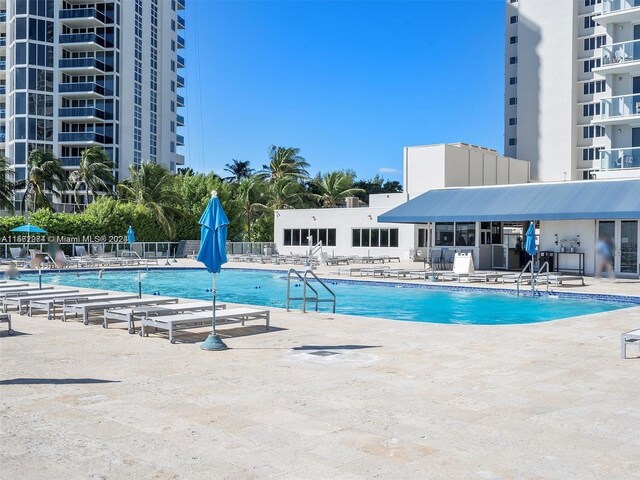 view of swimming pool featuring a patio