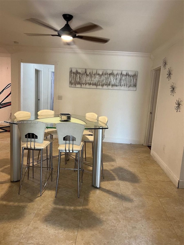 dining room featuring tile floors and ceiling fan