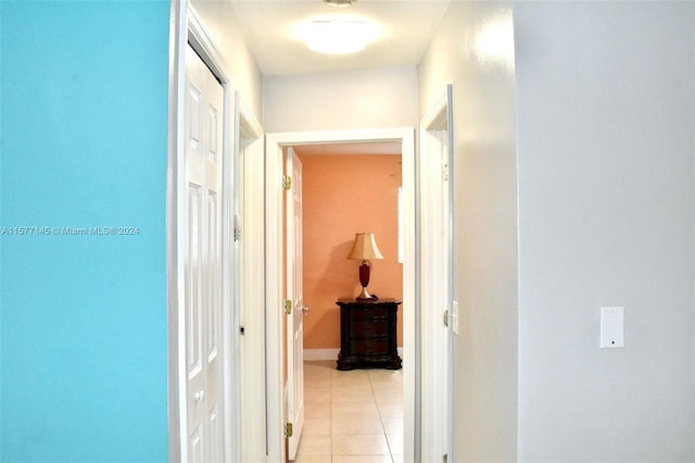 corridor with light tile floors