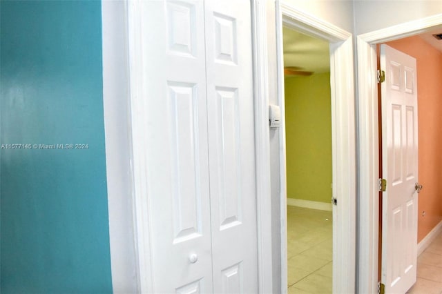 hall with light tile flooring