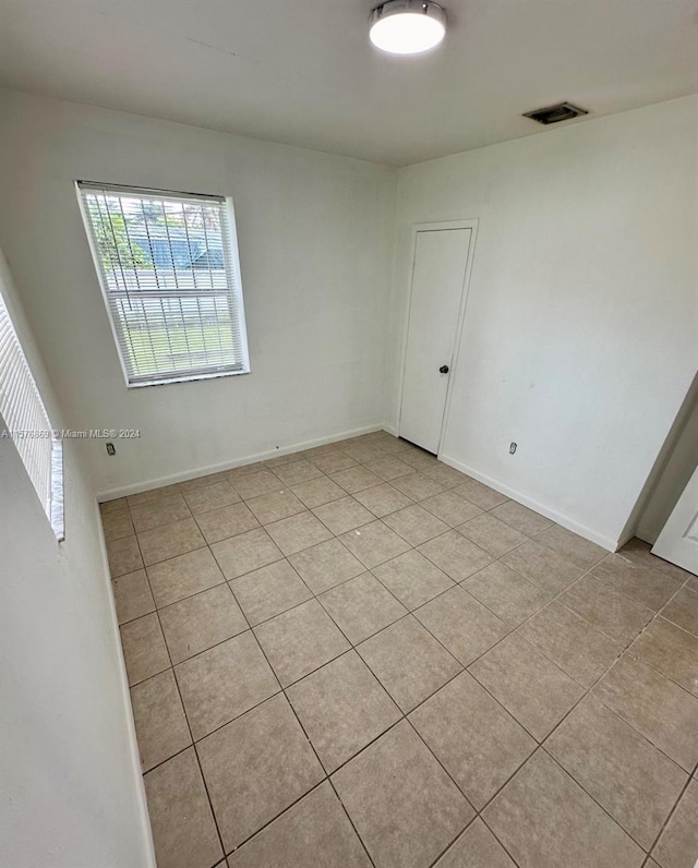 view of tiled empty room