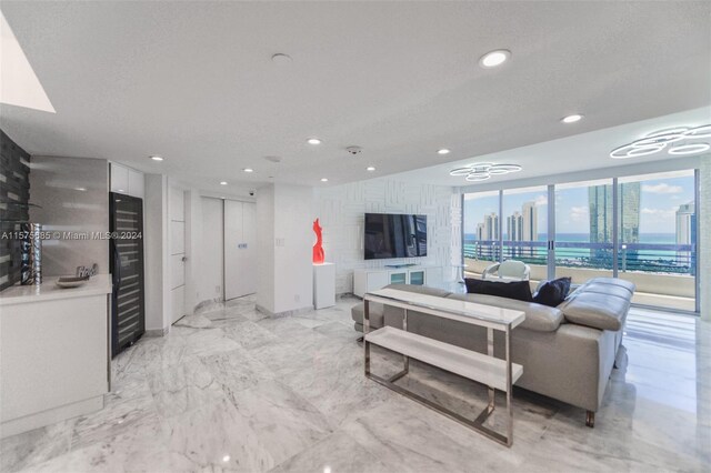 tiled living room with a textured ceiling