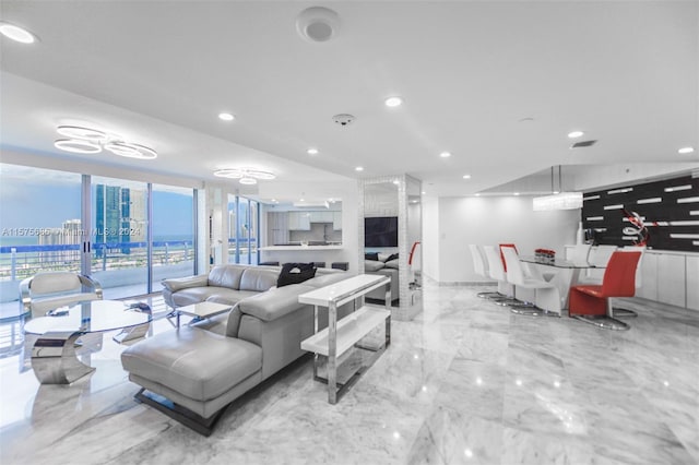 living room with floor to ceiling windows