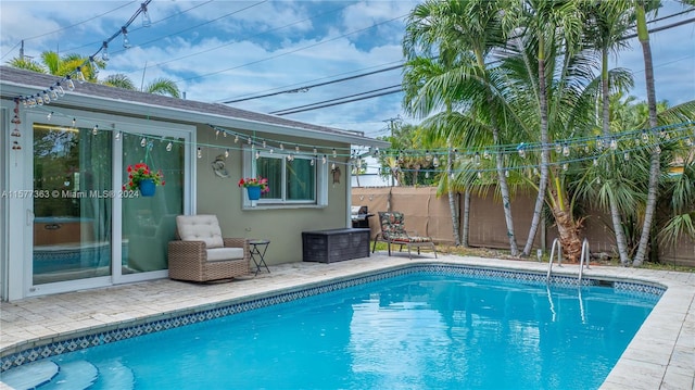 view of pool featuring a patio area