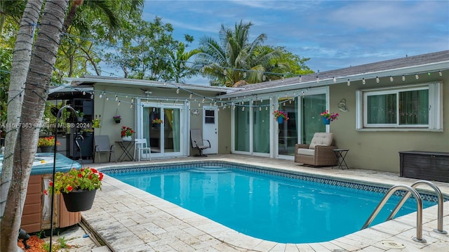 rear view of property with a patio