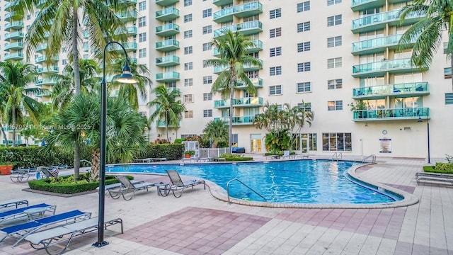 view of swimming pool with a patio