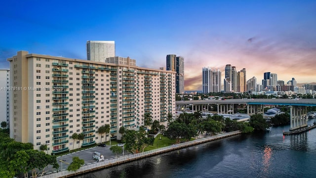 property's view of city featuring a water view