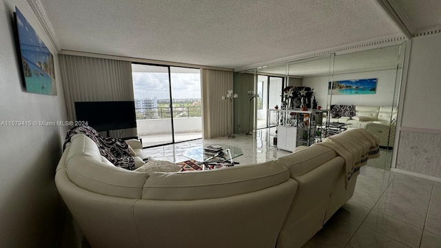 living room with a textured ceiling, floor to ceiling windows, tile floors, and crown molding