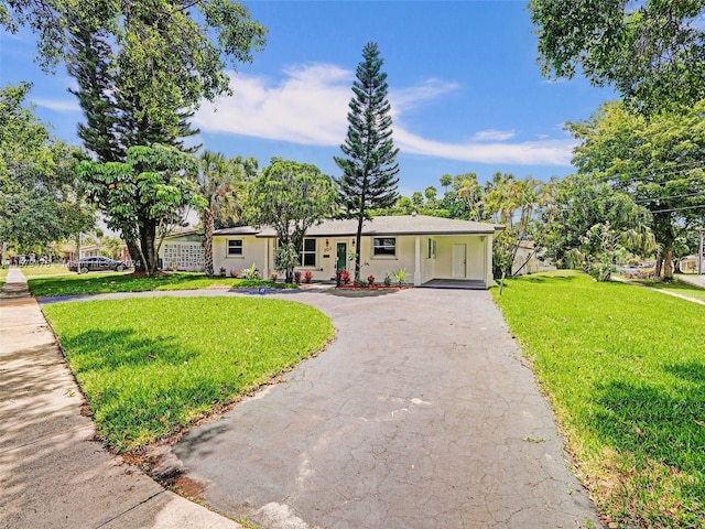 single story home with a front yard