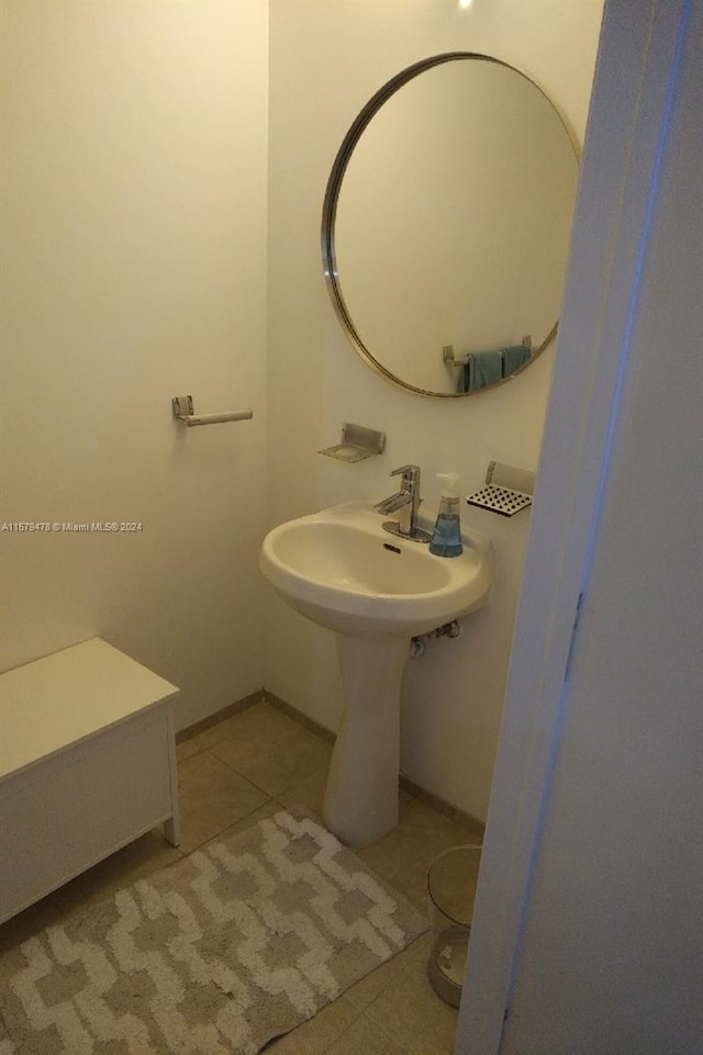 bathroom featuring tile floors