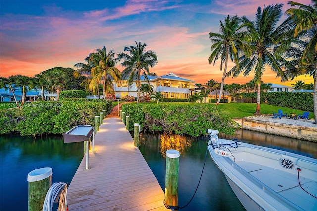 view of dock with a water view