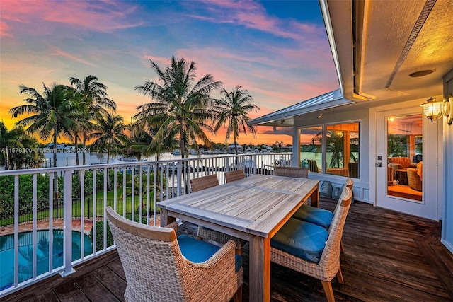 deck at dusk with a water view