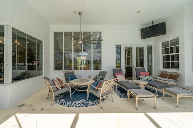 view of patio / terrace featuring french doors and an outdoor living space