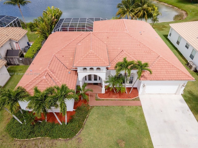 drone / aerial view featuring a water view