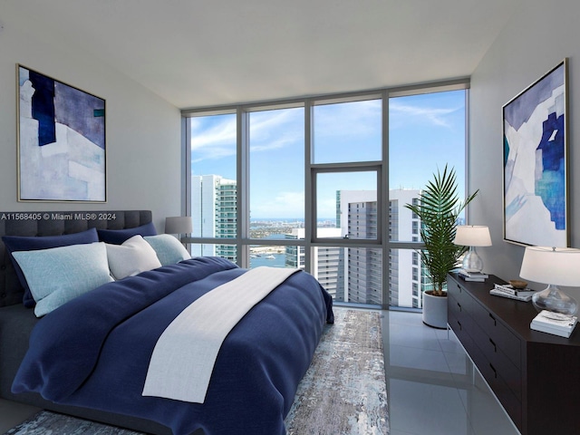 tiled bedroom with expansive windows and multiple windows