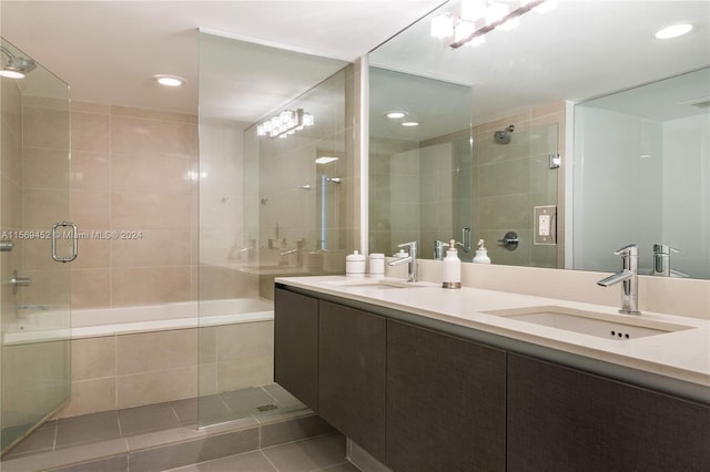 bathroom with tile floors and dual vanity