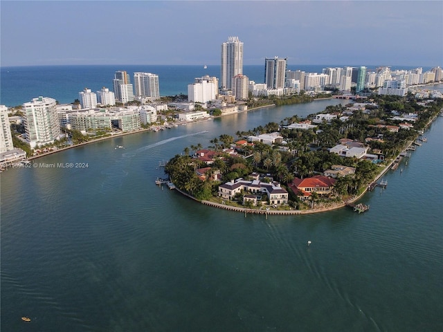 drone / aerial view featuring a water view