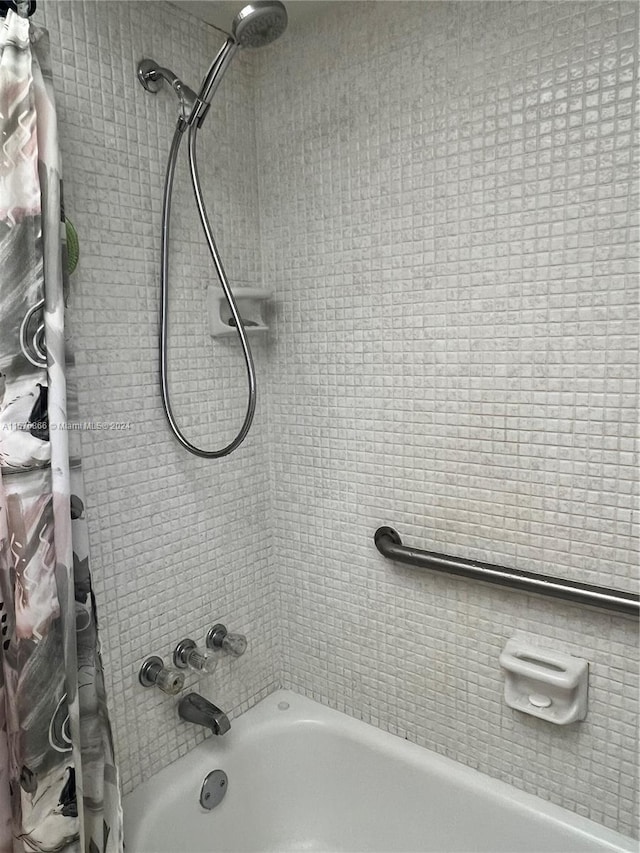 bathroom featuring shower / tub combo