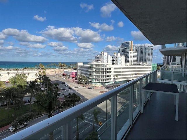 balcony featuring a water view