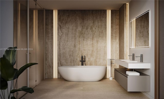 bathroom featuring sink and concrete flooring