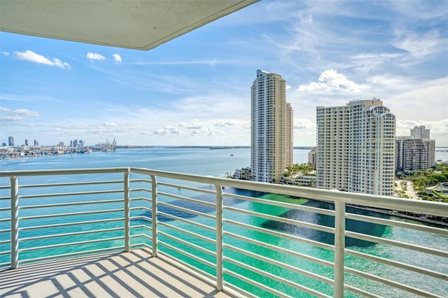 balcony featuring a water view