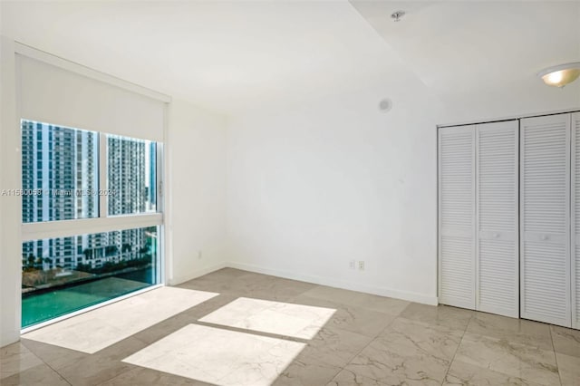 unfurnished bedroom featuring a closet