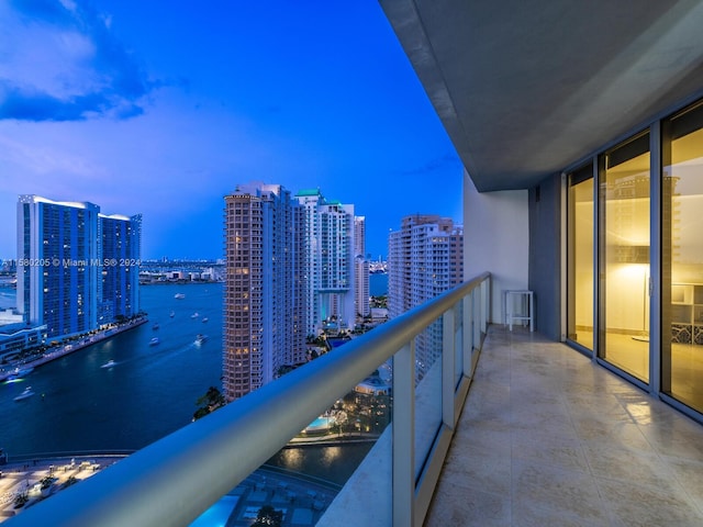 balcony at dusk with a water view