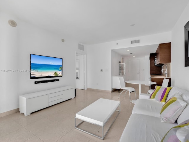 tiled living room with sink