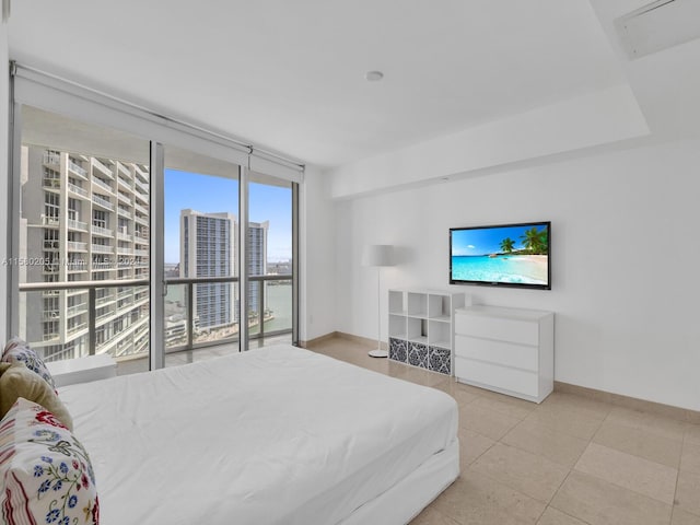 tiled bedroom with multiple windows