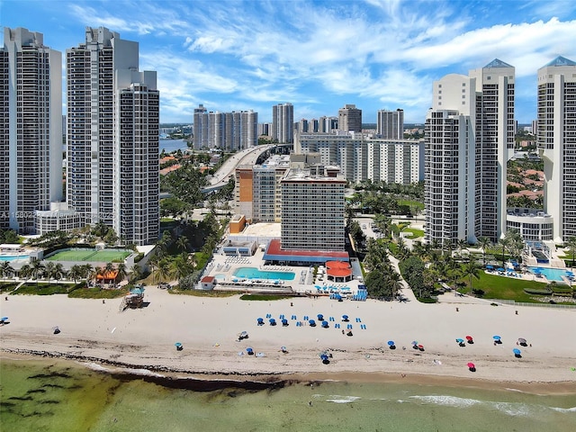 view of city with a water view and a beach view