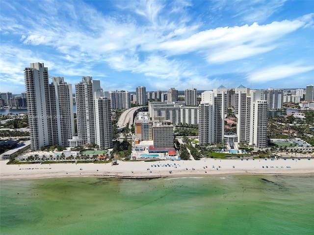 aerial view with a beach view and a water view