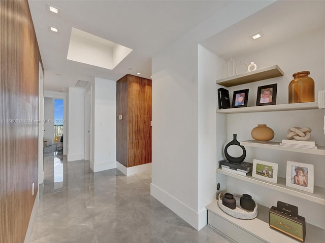 hallway with light tile floors