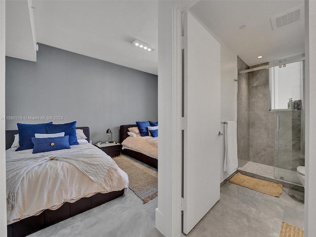 bedroom featuring light tile floors