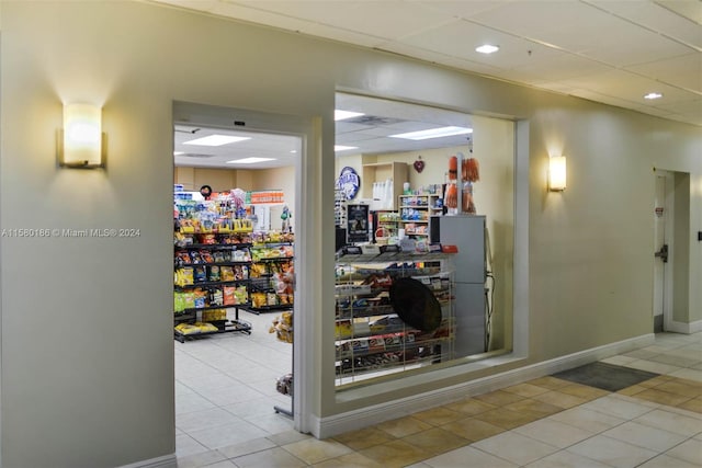 hallway with light tile flooring