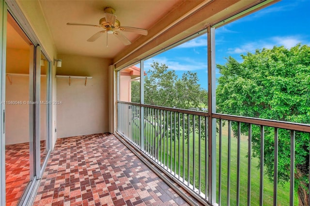 balcony featuring a ceiling fan