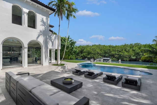 view of swimming pool with a patio area and an outdoor hangout area