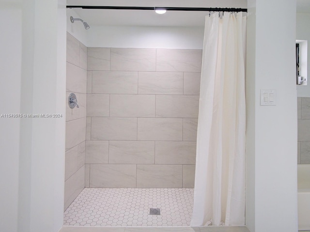 bathroom with curtained shower