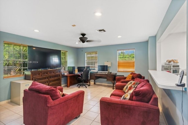 living room with ceiling fan and light tile floors