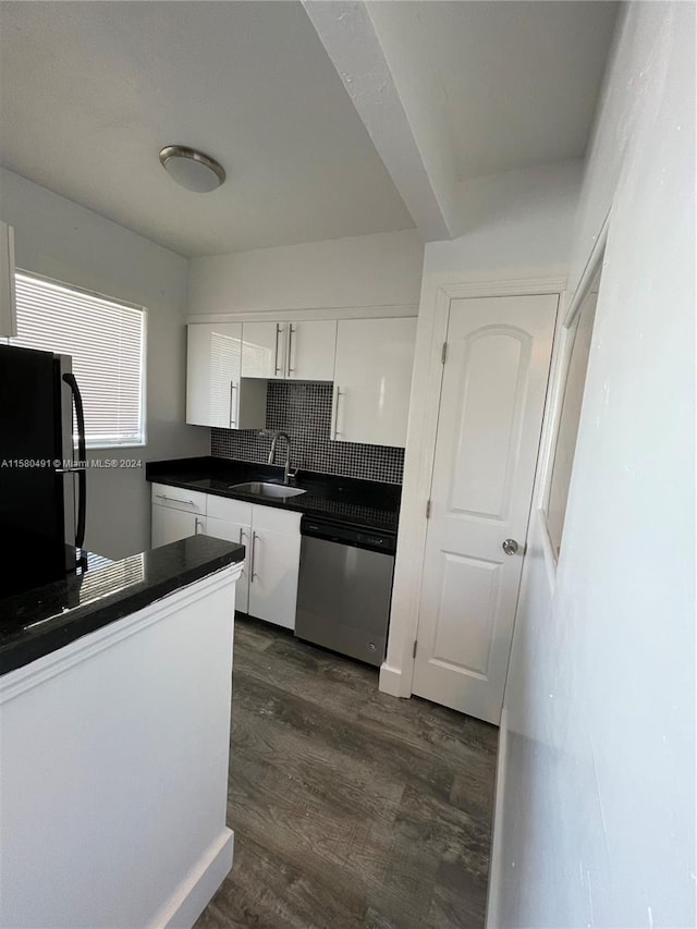 kitchen featuring fridge, sink, dishwasher, white cabinetry, and dark hardwood / wood-style floors