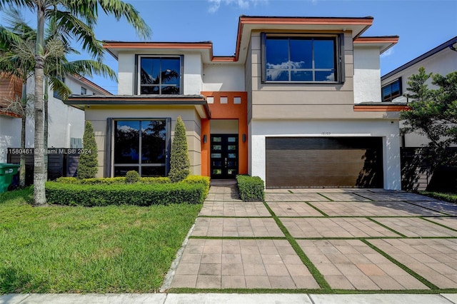 view of front of property with a garage