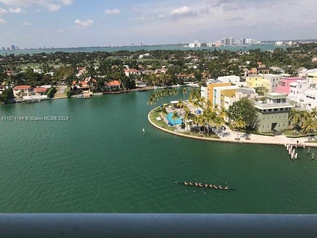 birds eye view of property featuring a water view